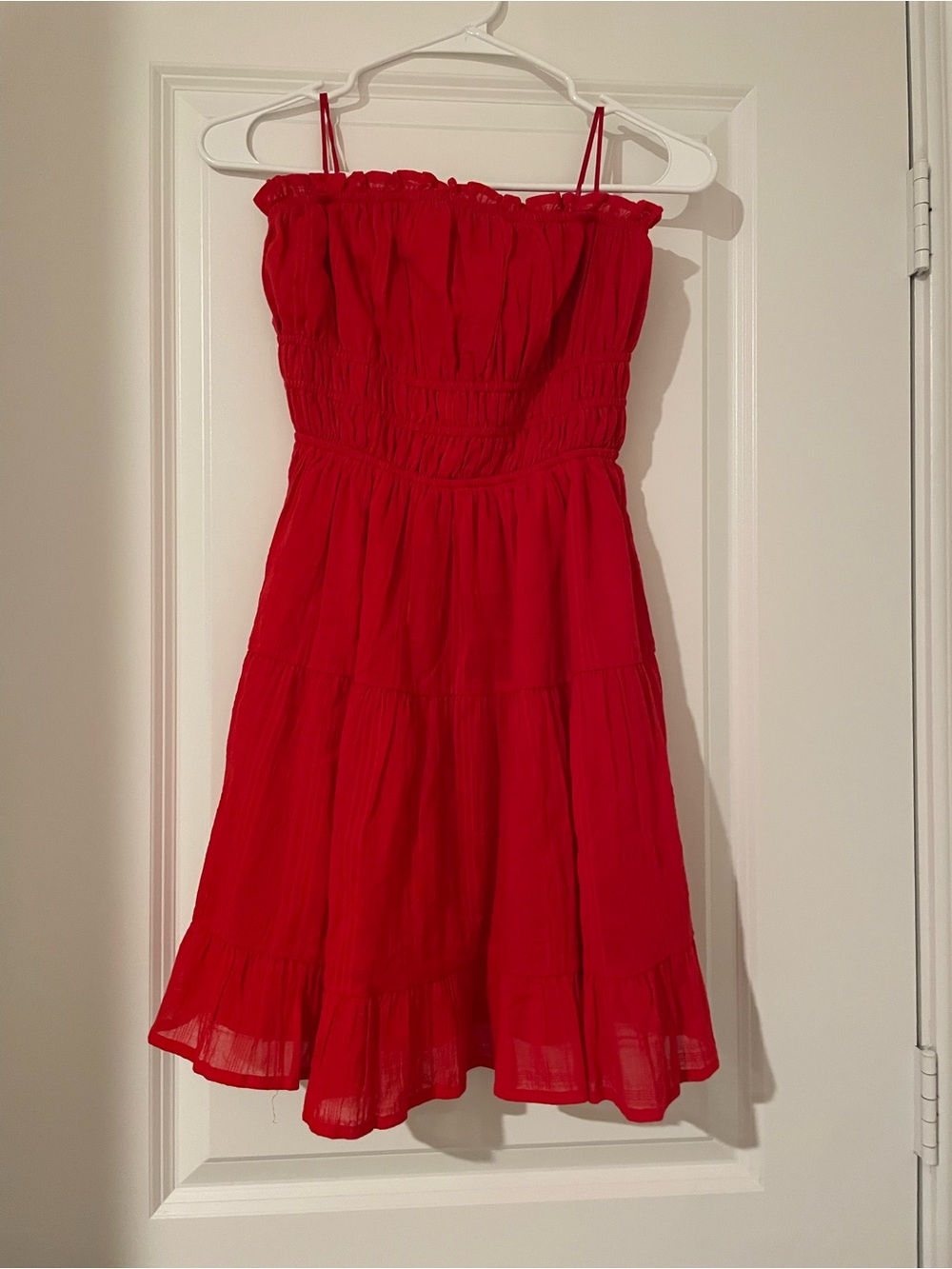 Sleeveless Red Smocked Mini Dress with Ruffle Hem